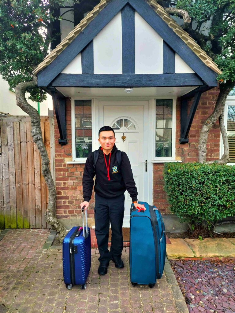 James San - Medical Sciences Student standing out the front of his home in the UK