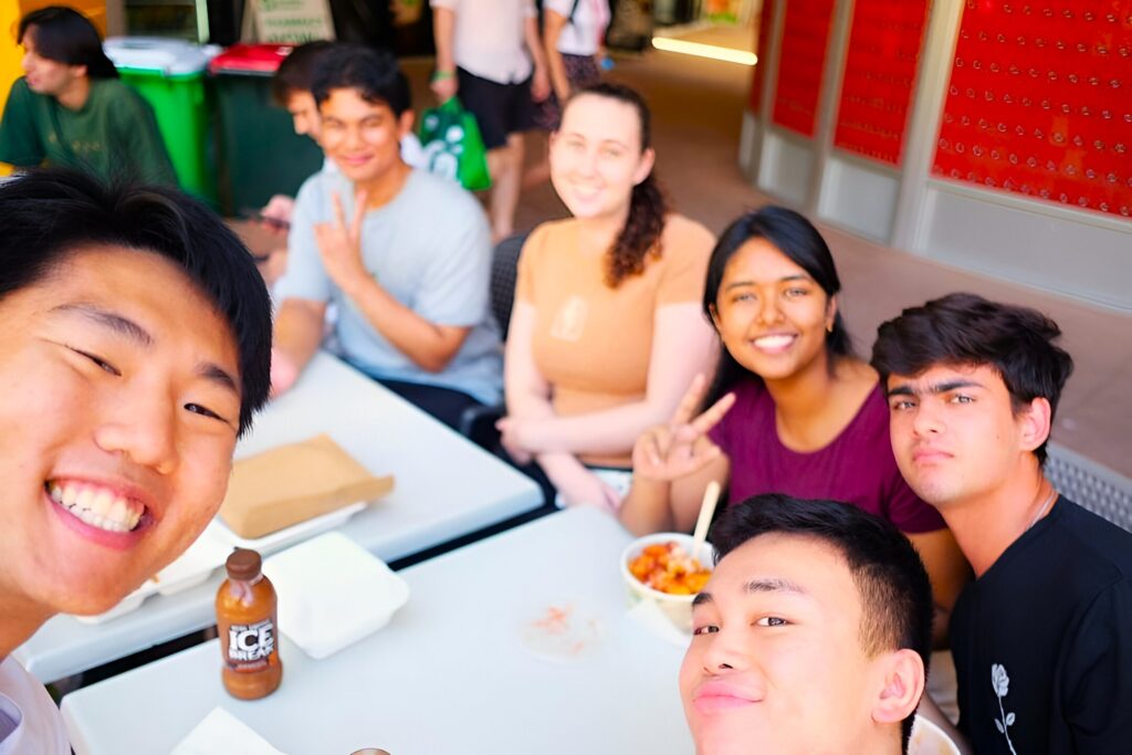 Group of students sitting around a table